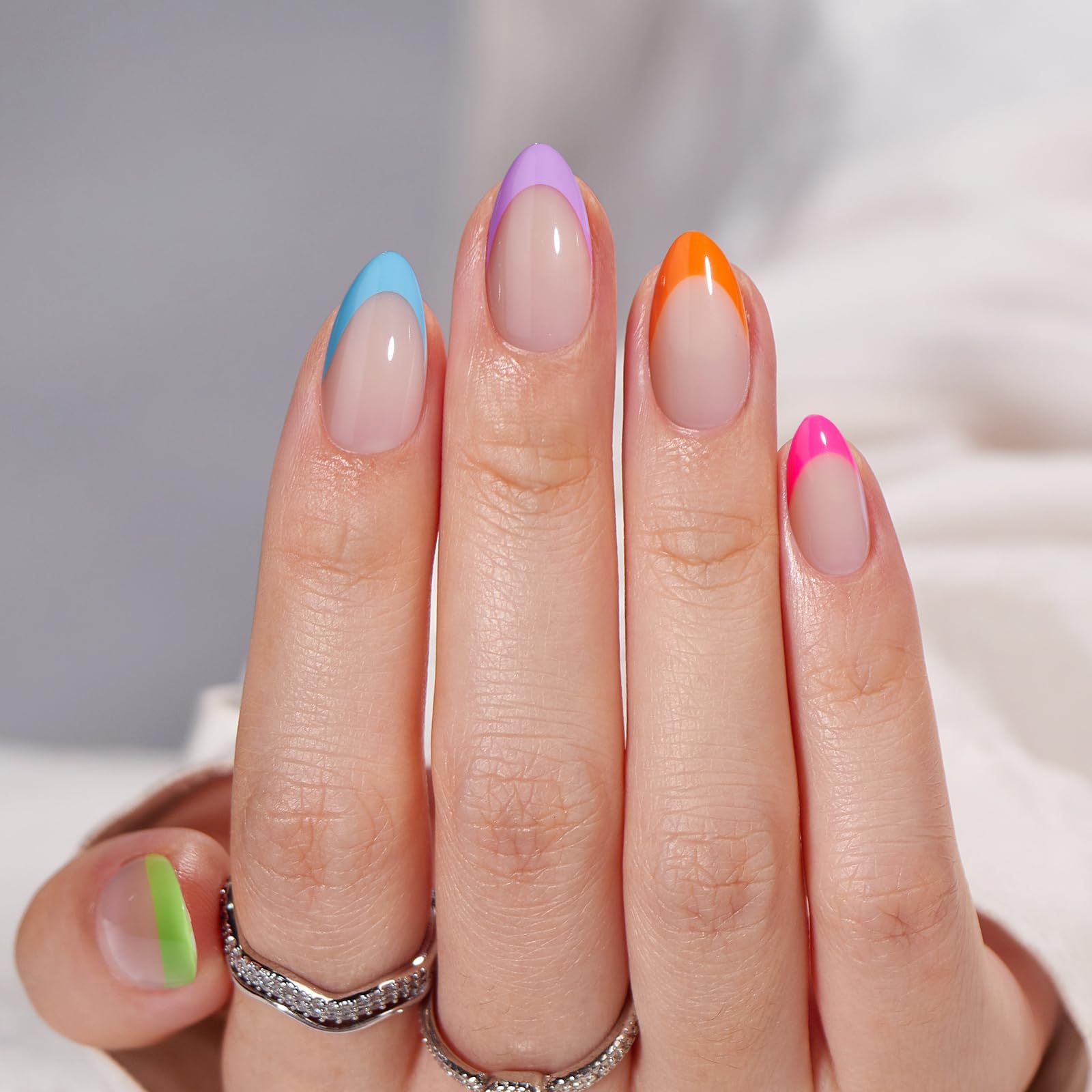 BTArtbox neon rainbow finish press-ons shown on nails for bold daily style.