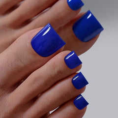 BTArtbox sharp square opaque blue toenails with glue for quick, salon-like pedicure.