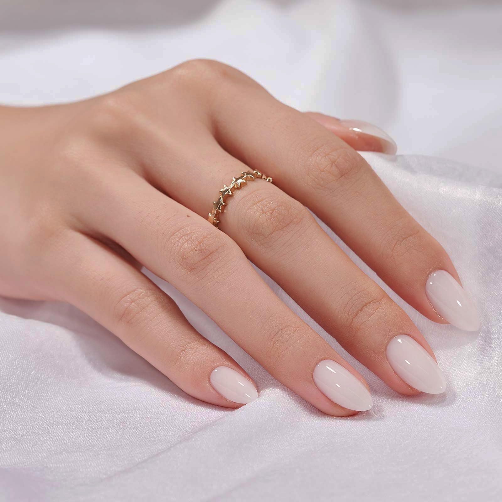 BTArtbox white press-on nails with soft gel almond shape for salon-like manicure.