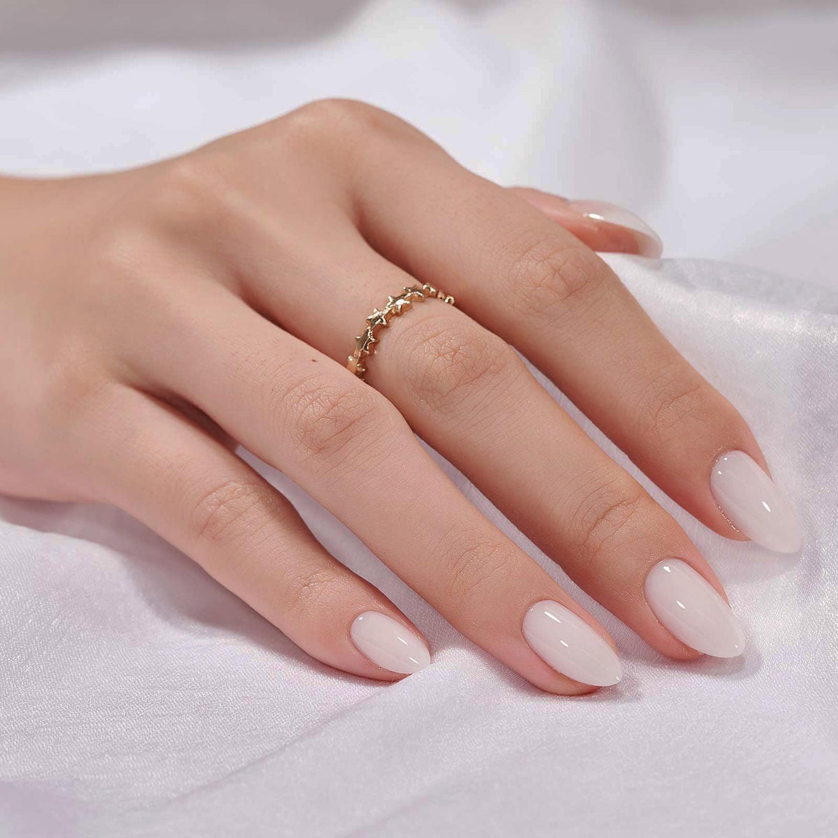 BTArtbox white press-on nails with soft gel almond shape for salon-like manicure.