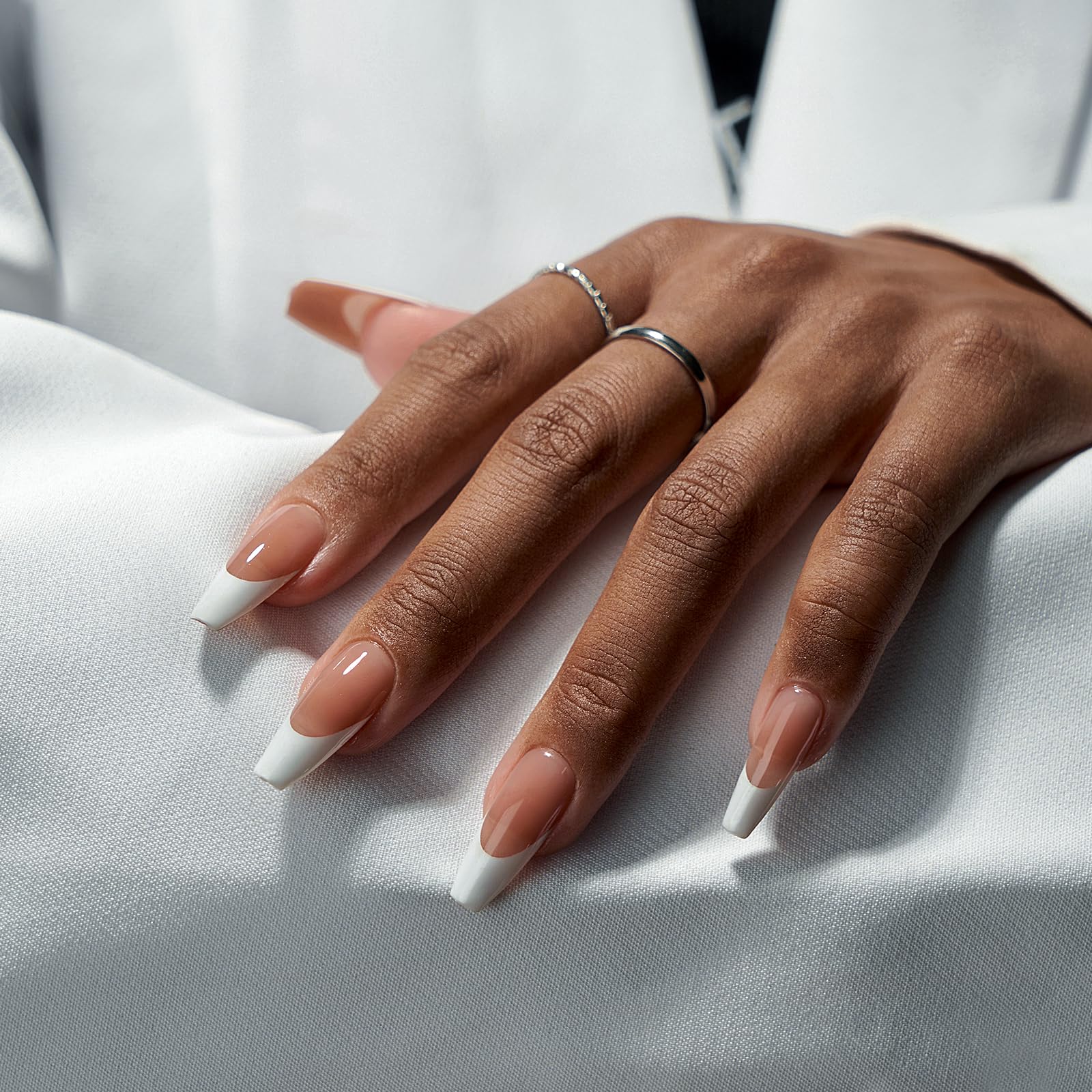 BTArtboxnails French tip press-on nails in brown medium coffin for at-home use.