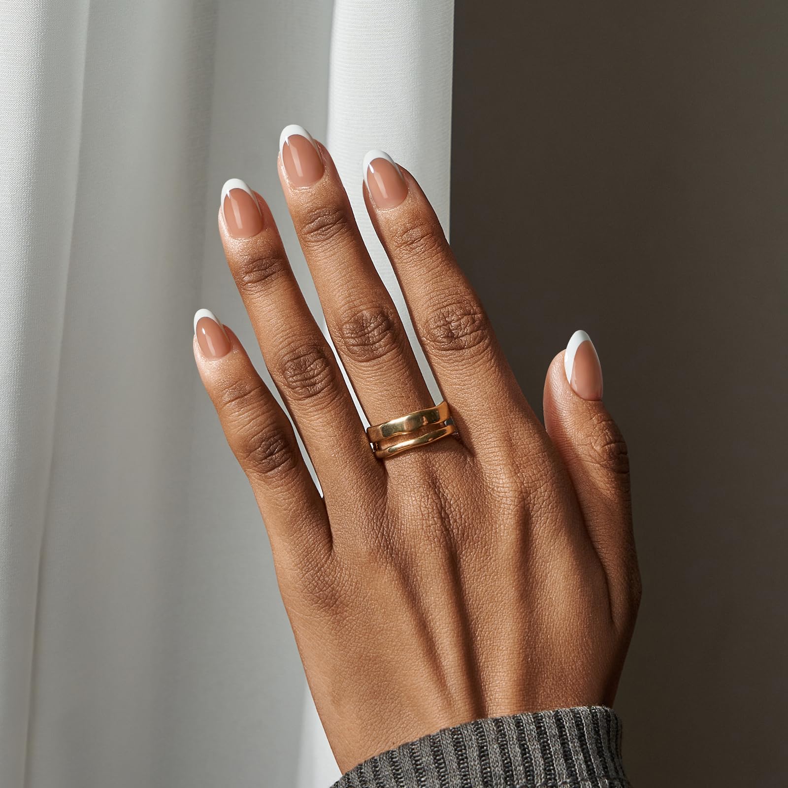 BTArtboxnails X-Coat process visual showing light through tips for durable gel curing.