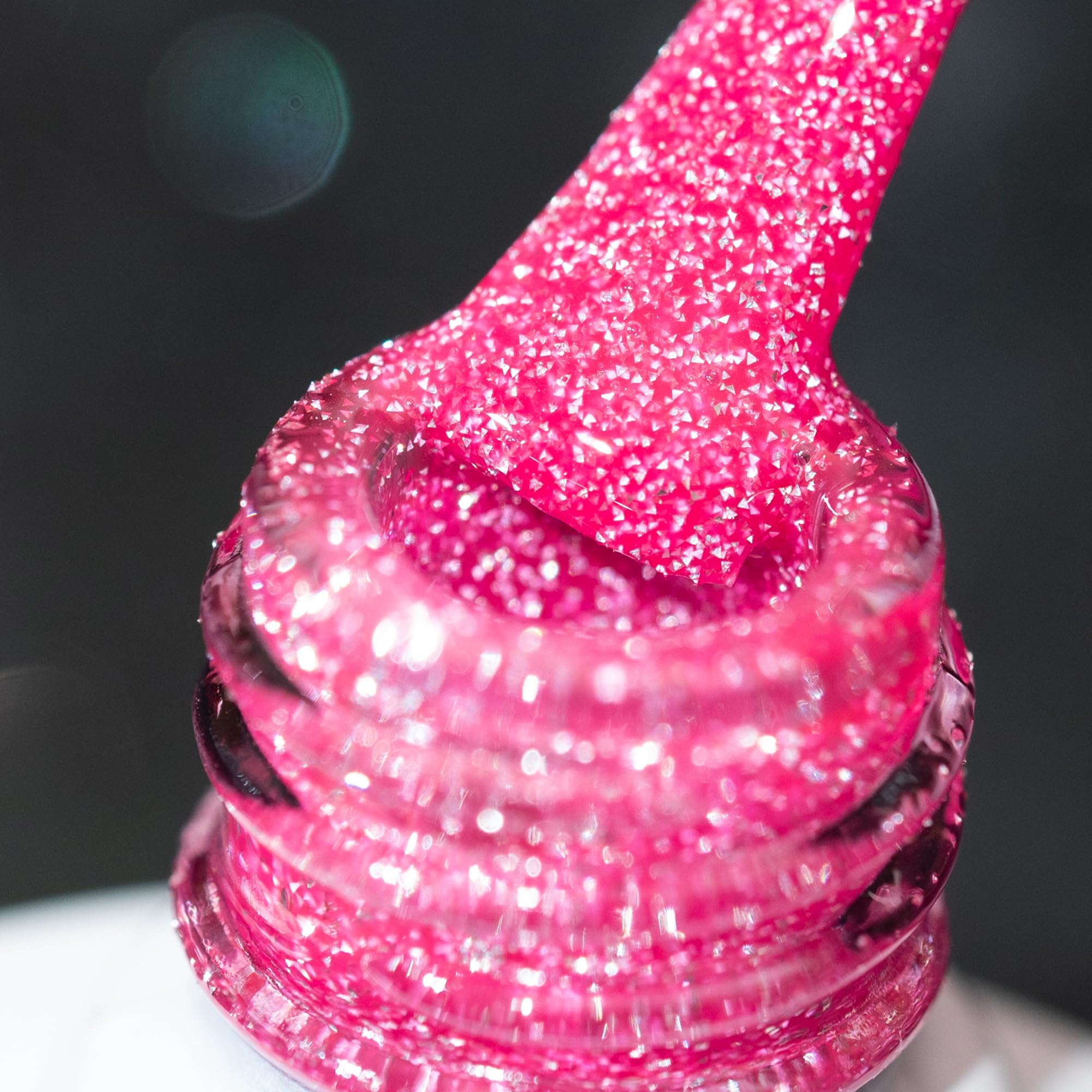 BURANO hot pink reflective glitter nail polish bottle for dramatic sparkle under lights.