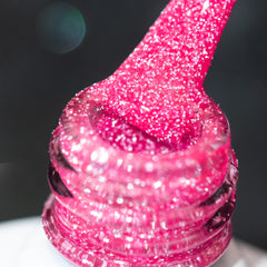 BURANO hot pink reflective glitter nail polish bottle for dramatic sparkle under lights.