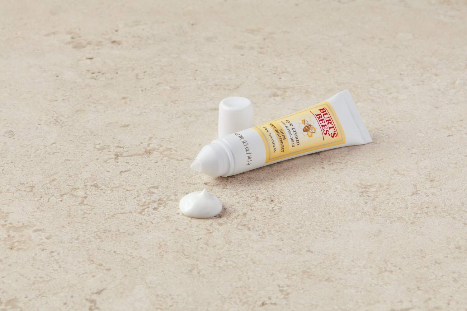Burt's Bees eye cream under-eye application demonstrating smooth nourishment