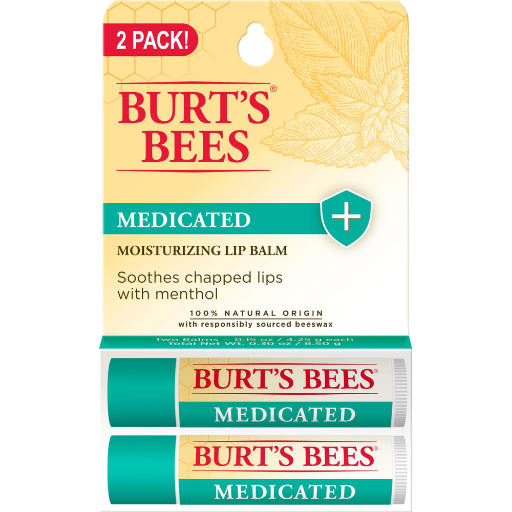 Application of Burt's Bees lip balm for soothing and moisturizing lips.