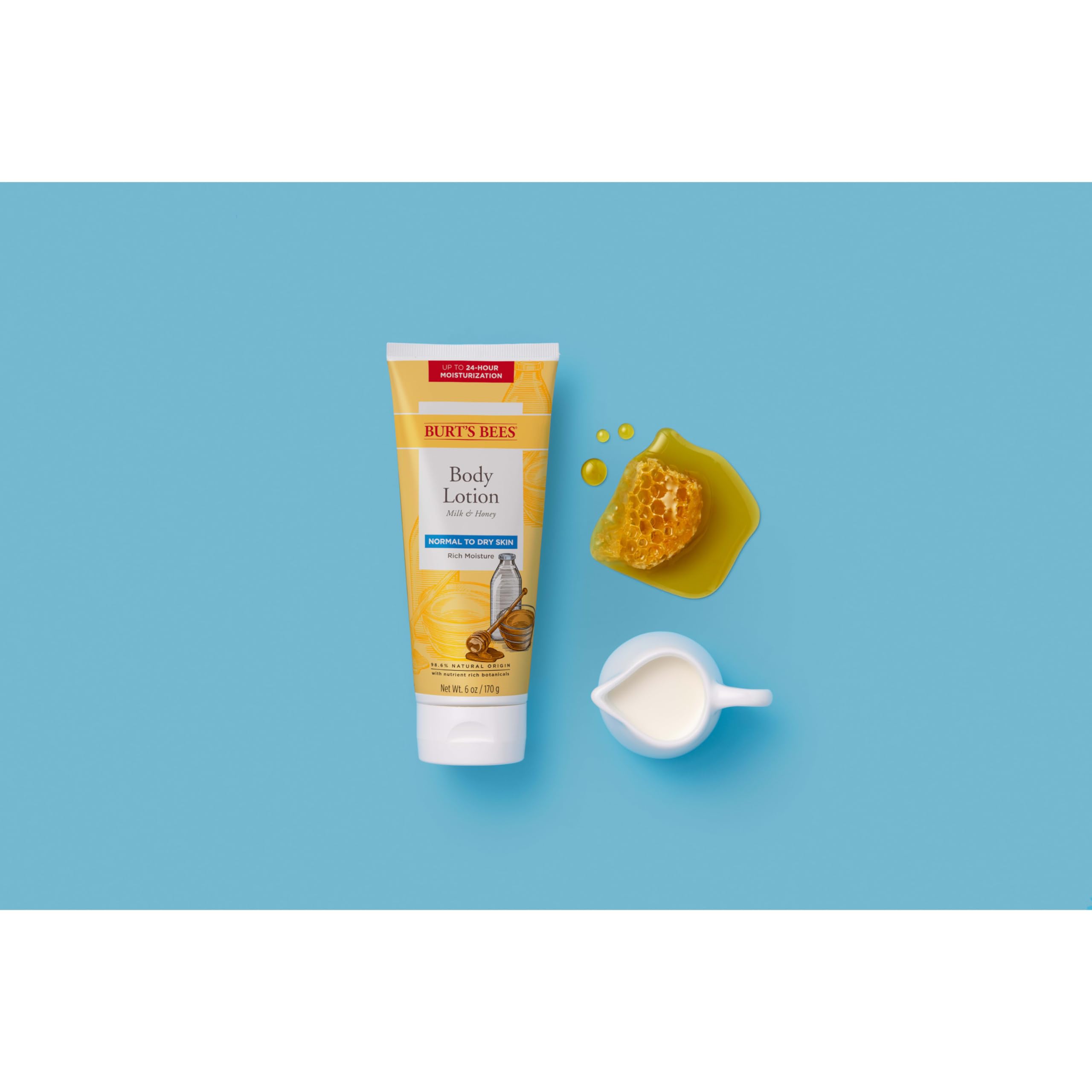 Applying Burt's Bees Milk and Honey lotion to arms for lasting moisture.