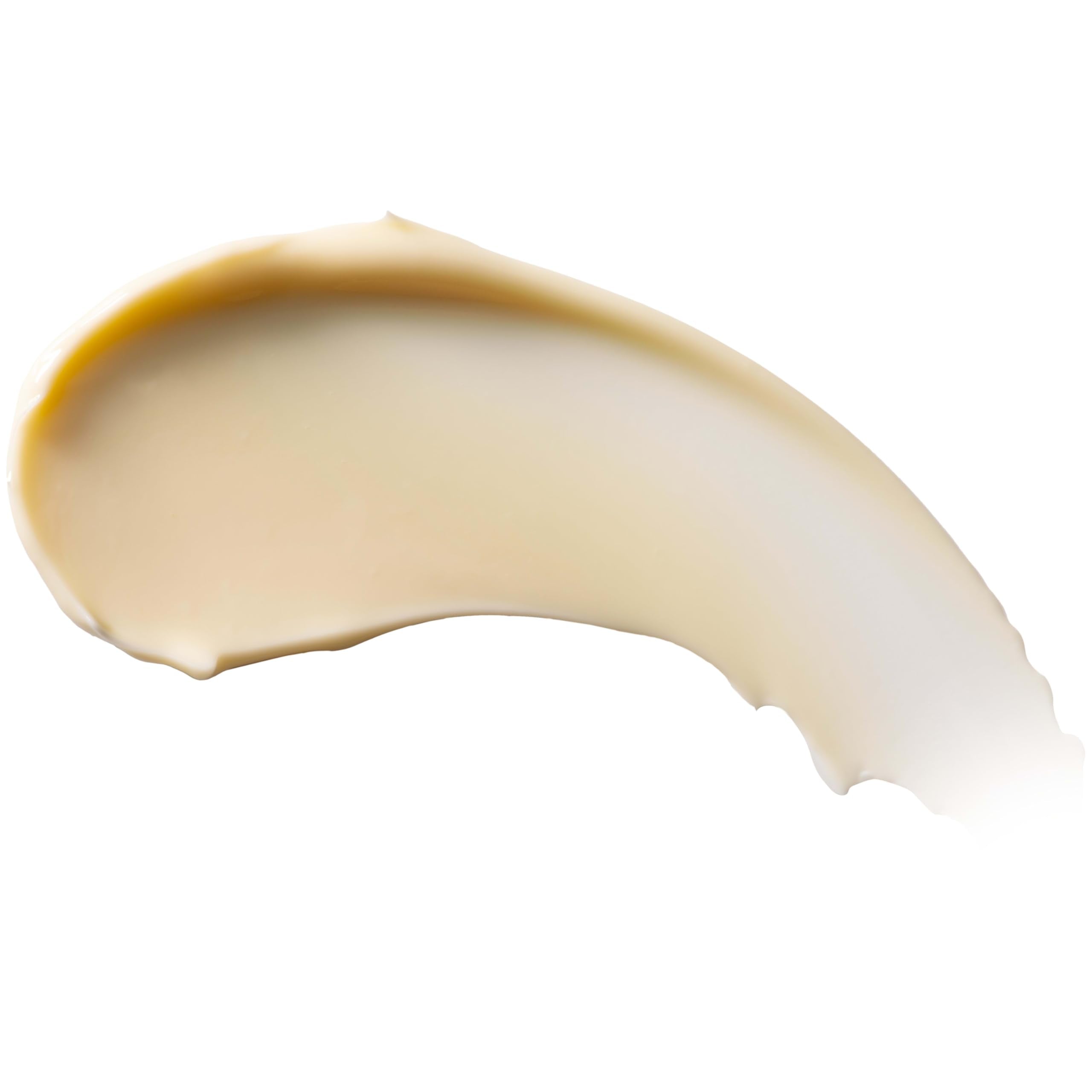 Creamy Burt's Bees lotion close-up on skin.
