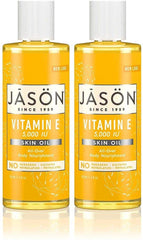 BUTO Jason Naturals Vitamin E Skin Oil bottle pour for smooth, nourished skin daily.