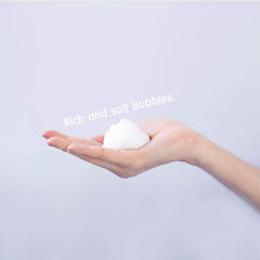 BUVLEY toner dispenser demonstrates controlled pour for precise skincare steps.