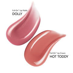 Buxom Hot Toddy lip cream mini close-up showing creamy texture
