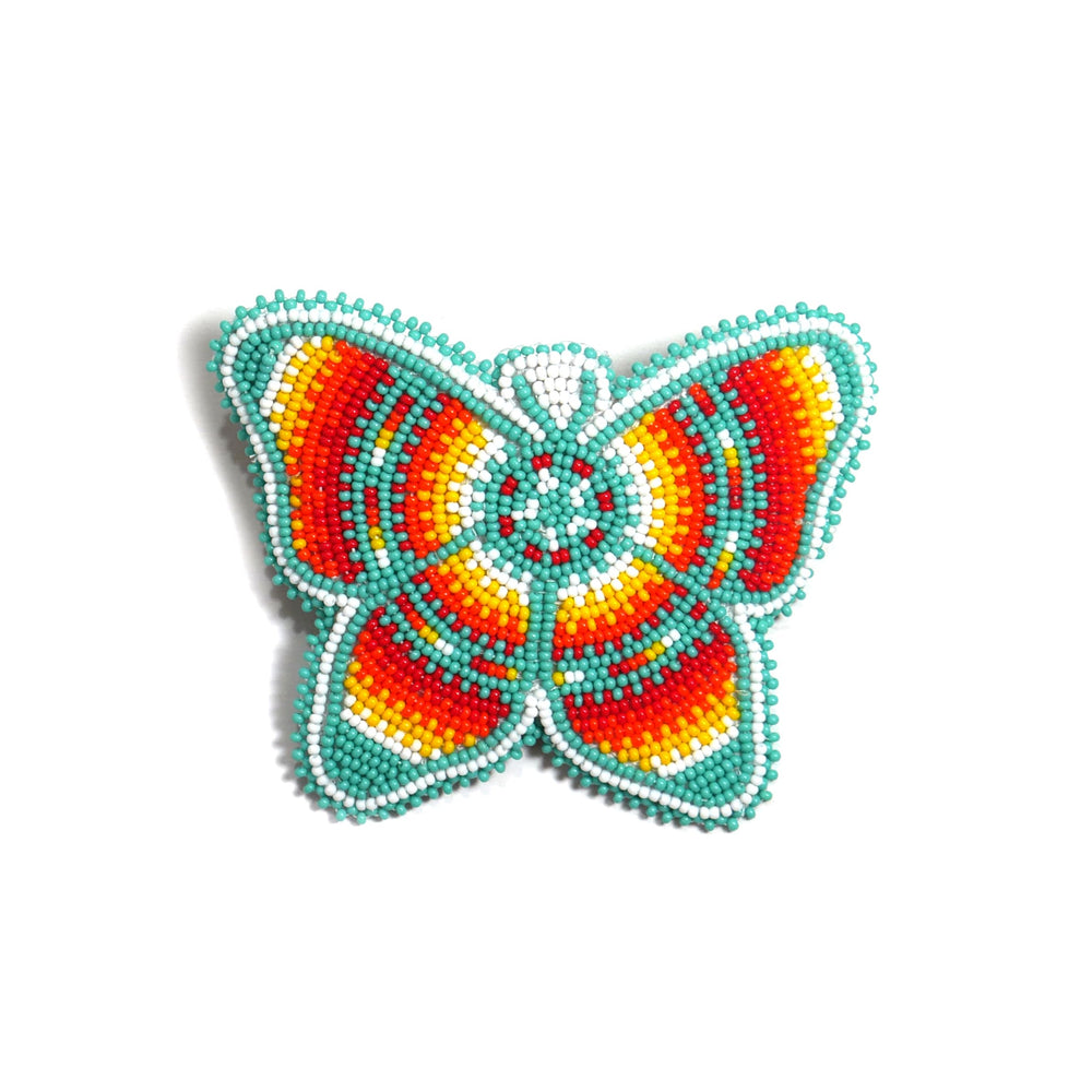 BuyBeaded butterfly turquoise hair clip showcases intricate beadwork and vibrant color