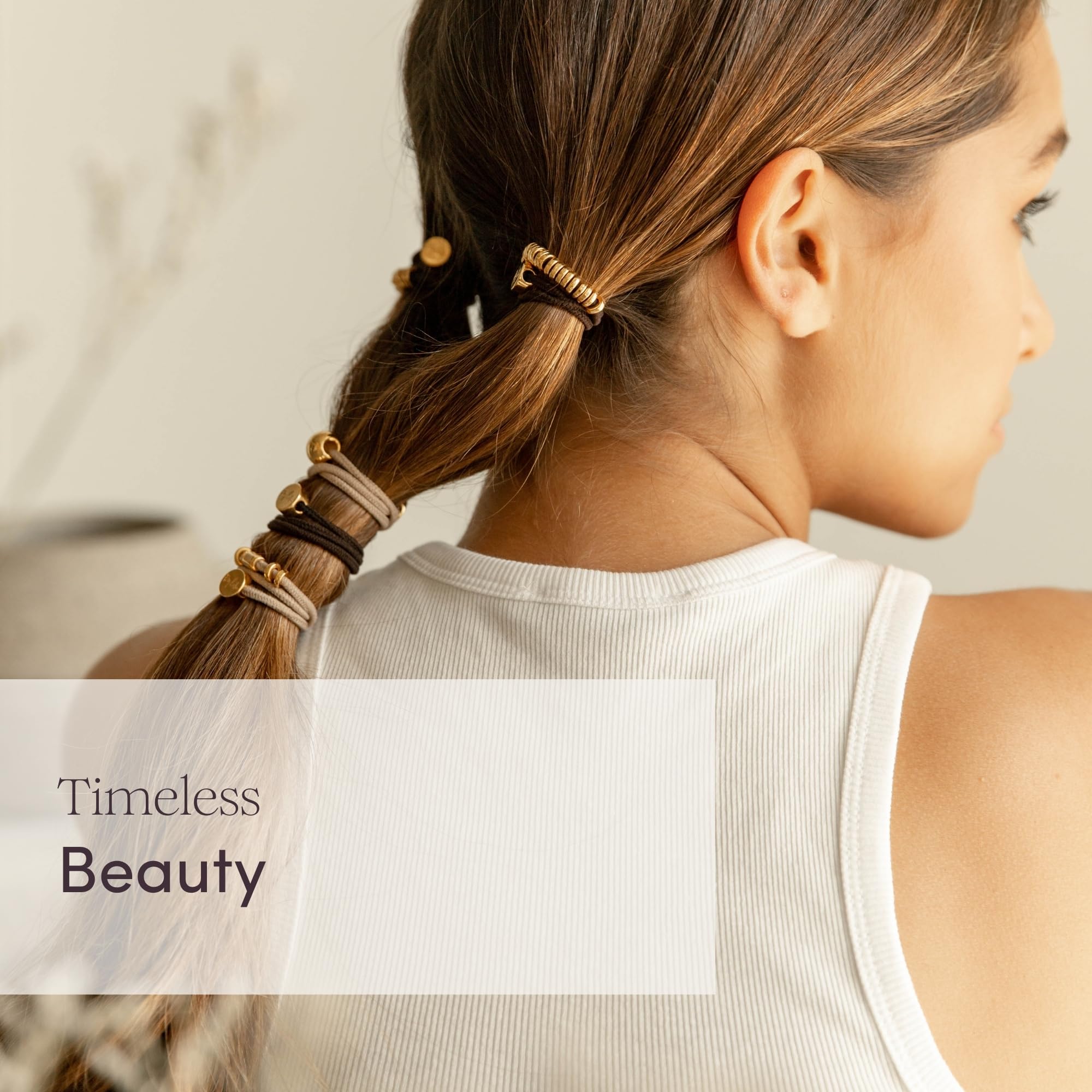 By Lilla gold and silver-tone hair ties add subtle shine to outfits.