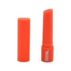 BY MARIO MoistureGlow Lip Serum swatches reveal a vibrant orange glow