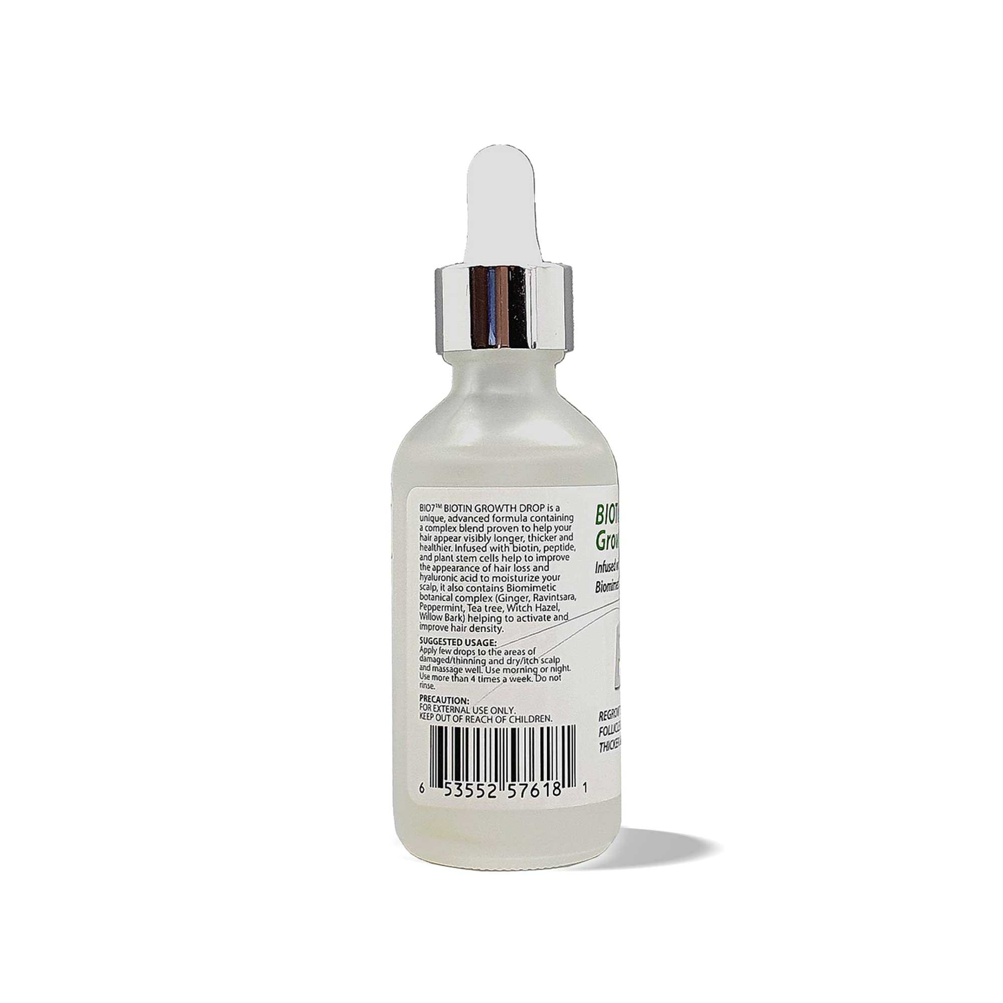 Bio7 bottle with liquid droplet mid-dispense for targeted scalp care.