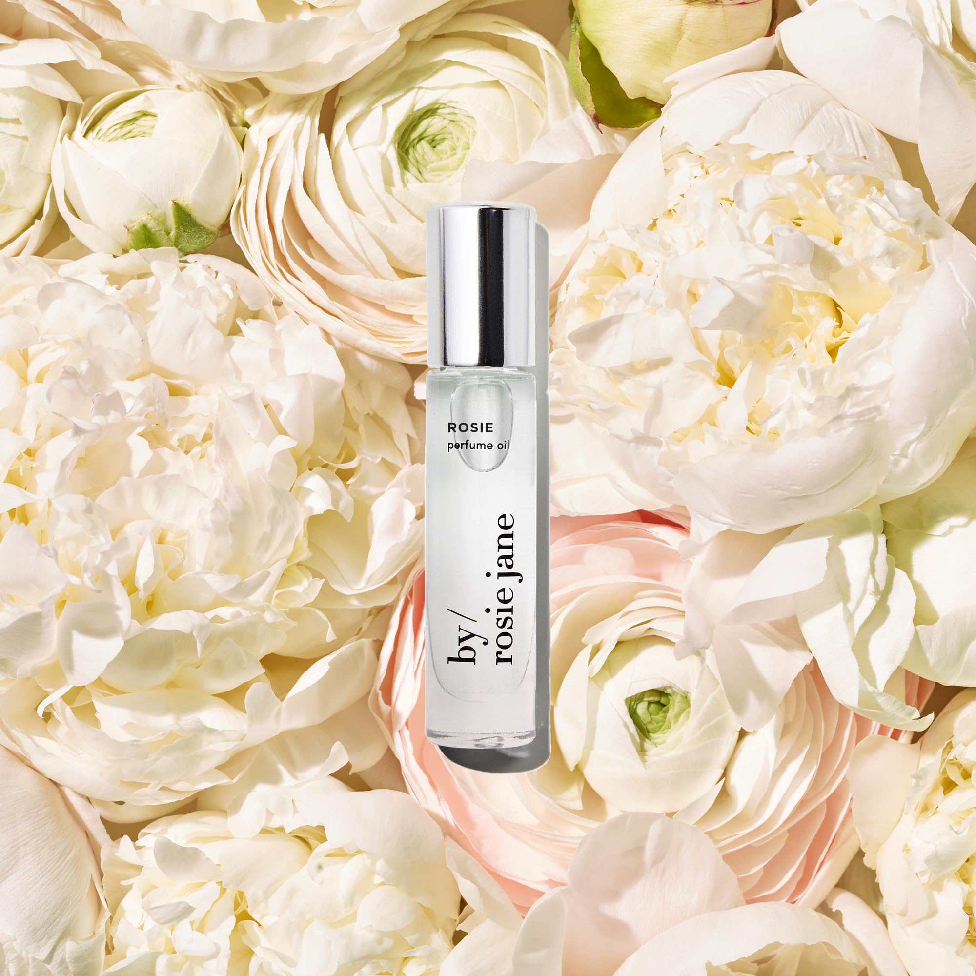 By Rosie Jane Rosie roll-on applied to pulse points for quick fragrance.