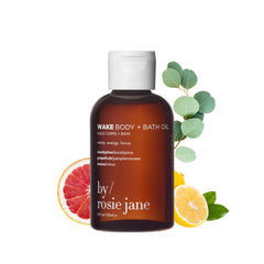 By Rosie Jane Wake bath oil bottle glistening for hydrated skin