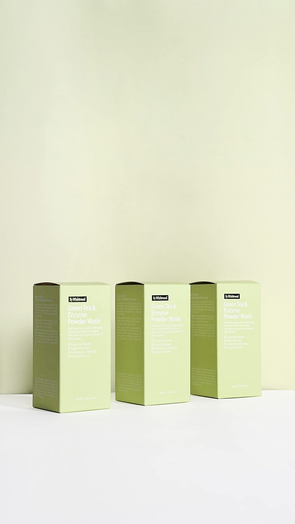 BY WISHTREND powder wash poured into palms to create a gentle foam.