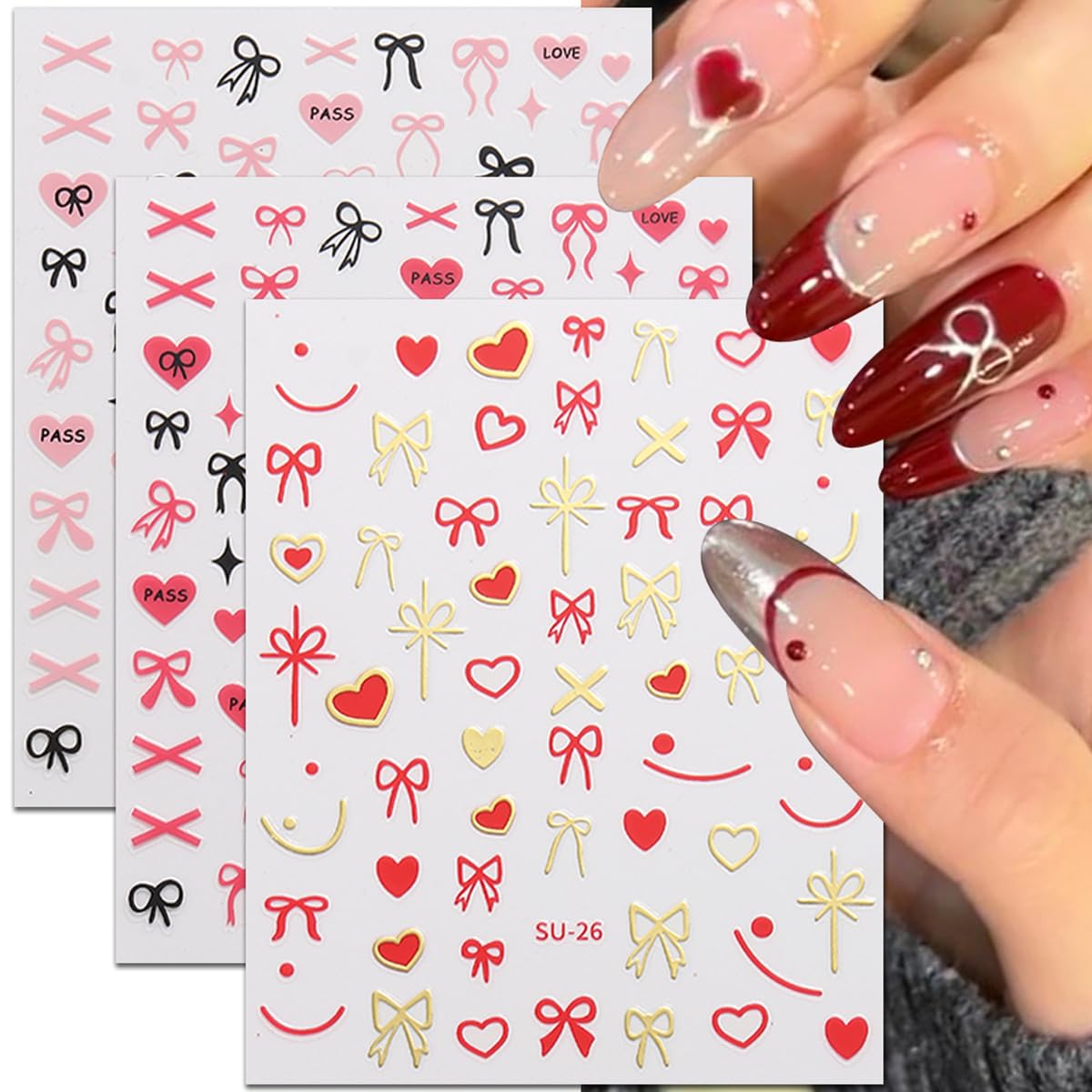 Vivid heart bow design in red, white and black for chic nail art.