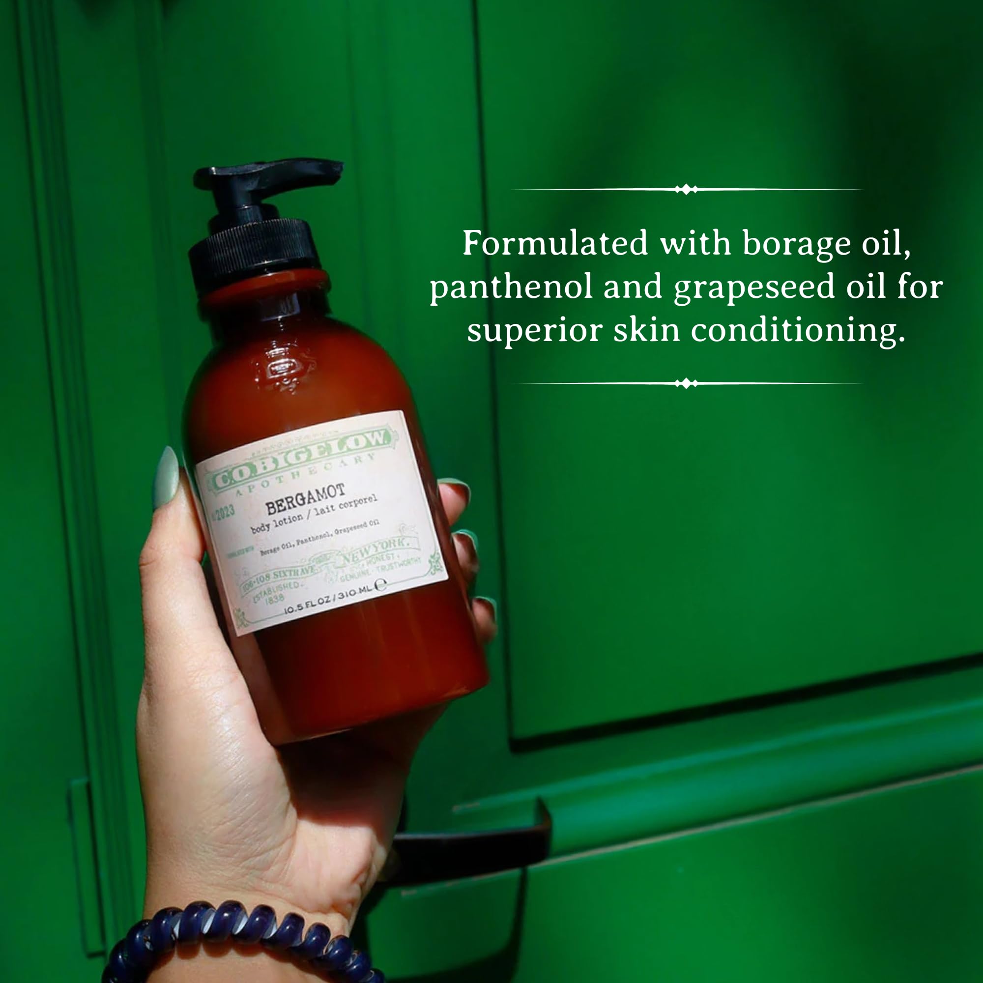 C.O. Bigelow Bergamot Body Lotion hands applying a moisturizing routine.