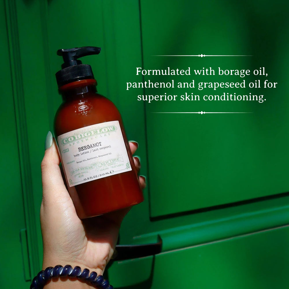 C.O. Bigelow Bergamot Body Lotion hands applying a moisturizing routine.