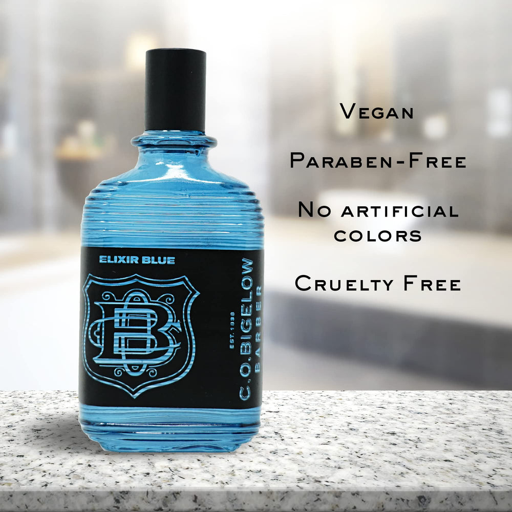 C.O. Bigelow Elixir Blue lit-glass showcases premium bottle clarity.