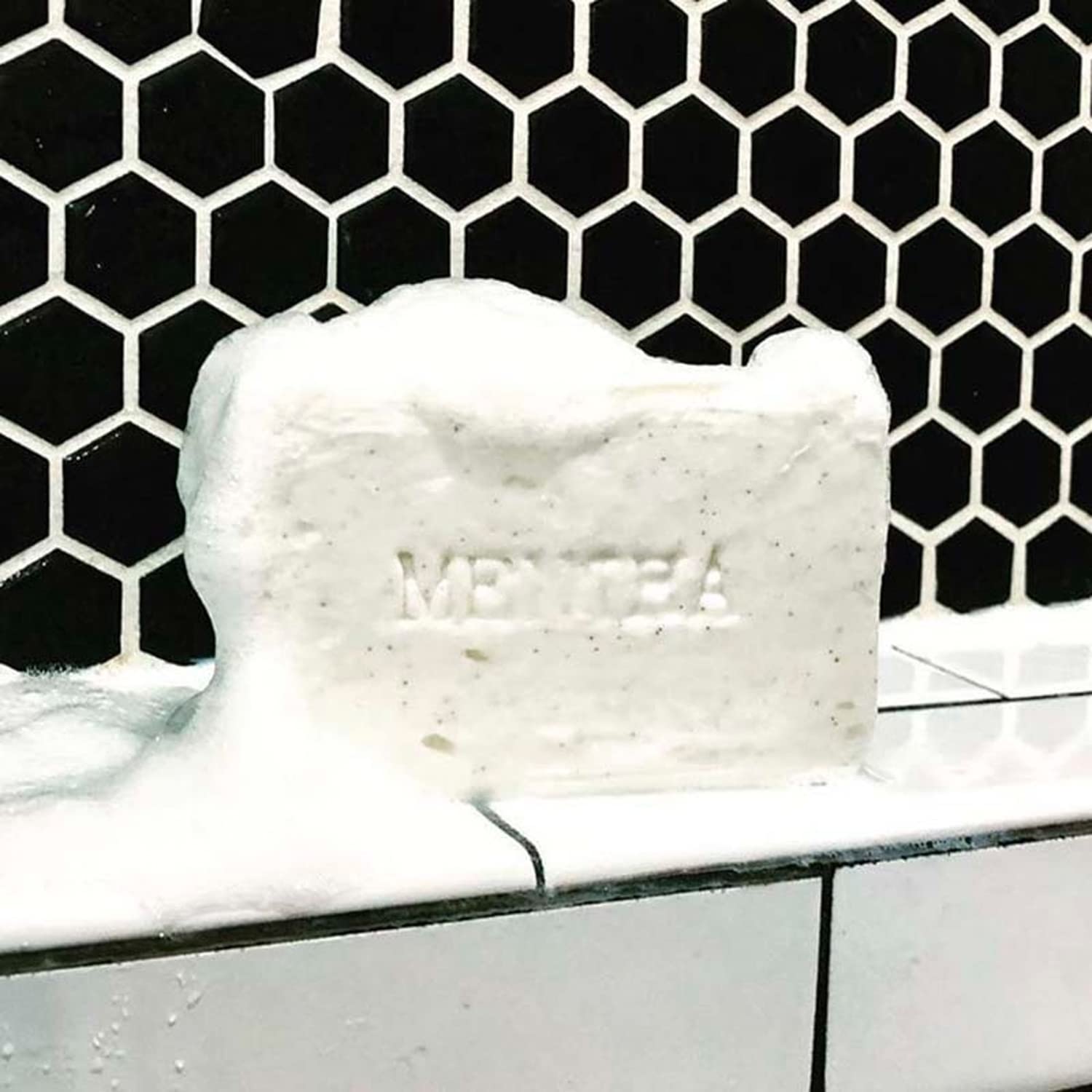 Two bars of C O Bigelow Mentha Exfoliating Bar Soap in packaging for gifting