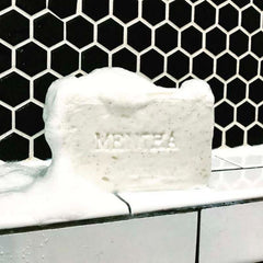 Two bars of C O Bigelow Mentha Exfoliating Bar Soap in packaging for gifting