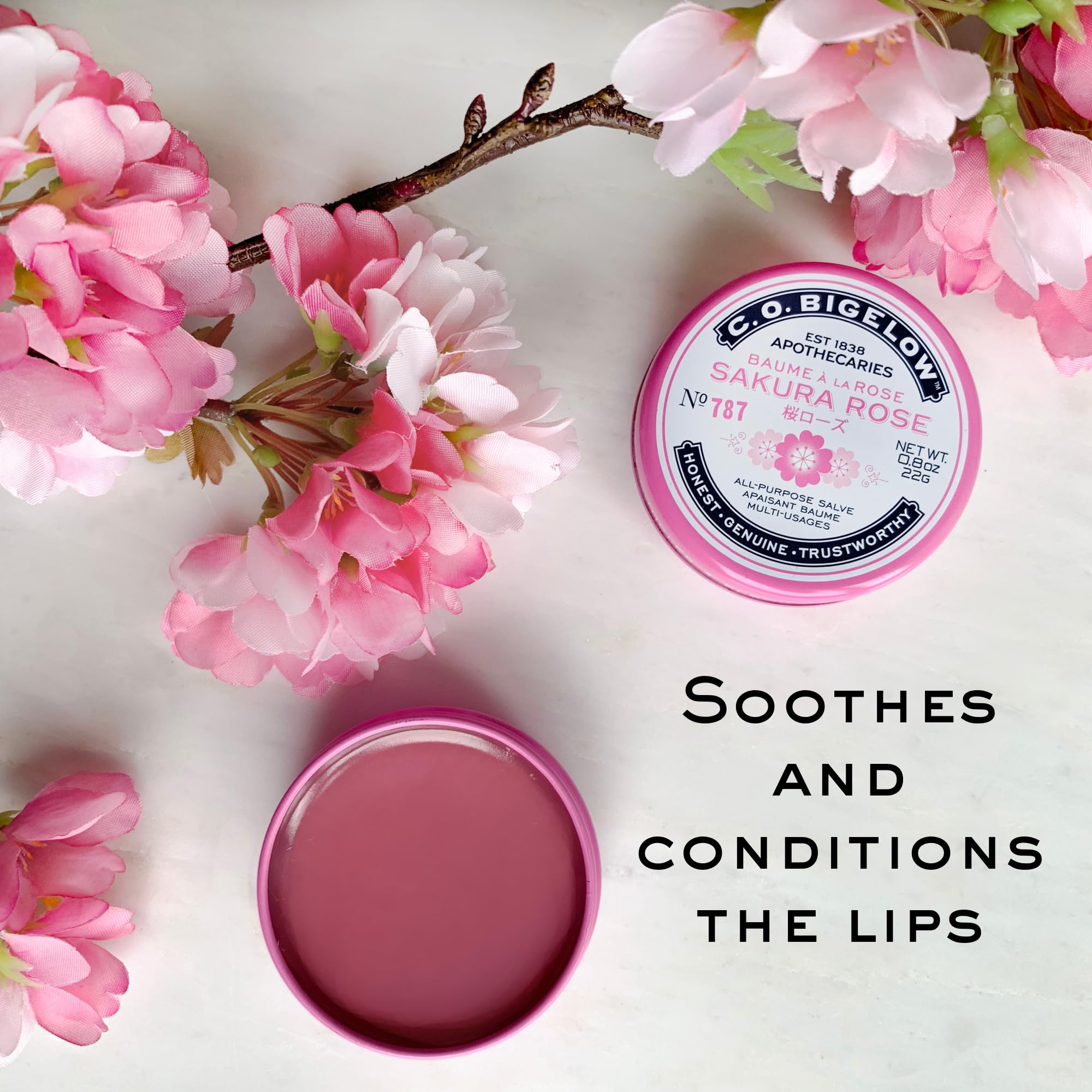 C.O. Bigelow Sakura Rose Salve Tin at desk provides quick moisture during work.