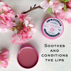 C.O. Bigelow Sakura Rose Salve Tin at desk provides quick moisture during work.