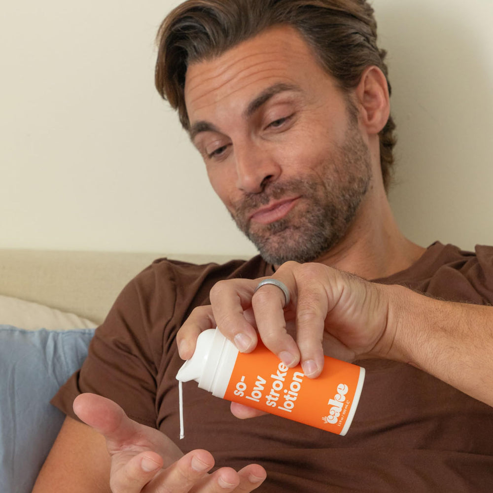 Cake So-Low Stroker Lotion label emphasizing clean, fragrance-free formula.