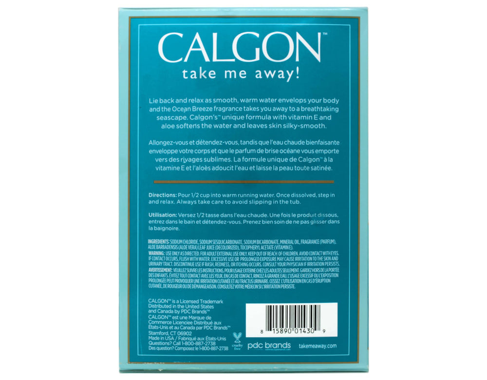 Pouring Calgon Ocean Breeze bath beads into warm water for a spa-like ritual.