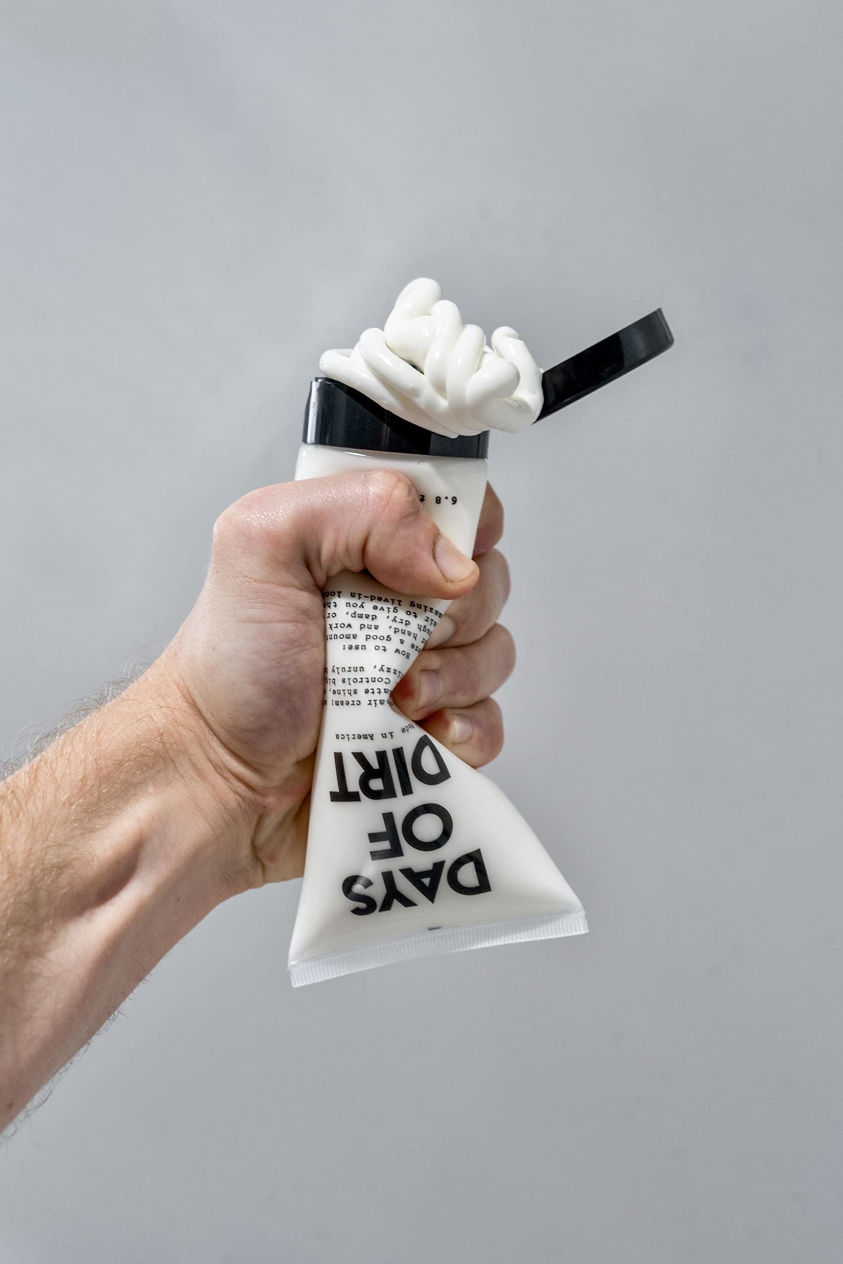California Born Days of Dirt packaging and tube design emphasizing clean, USA-made formula.