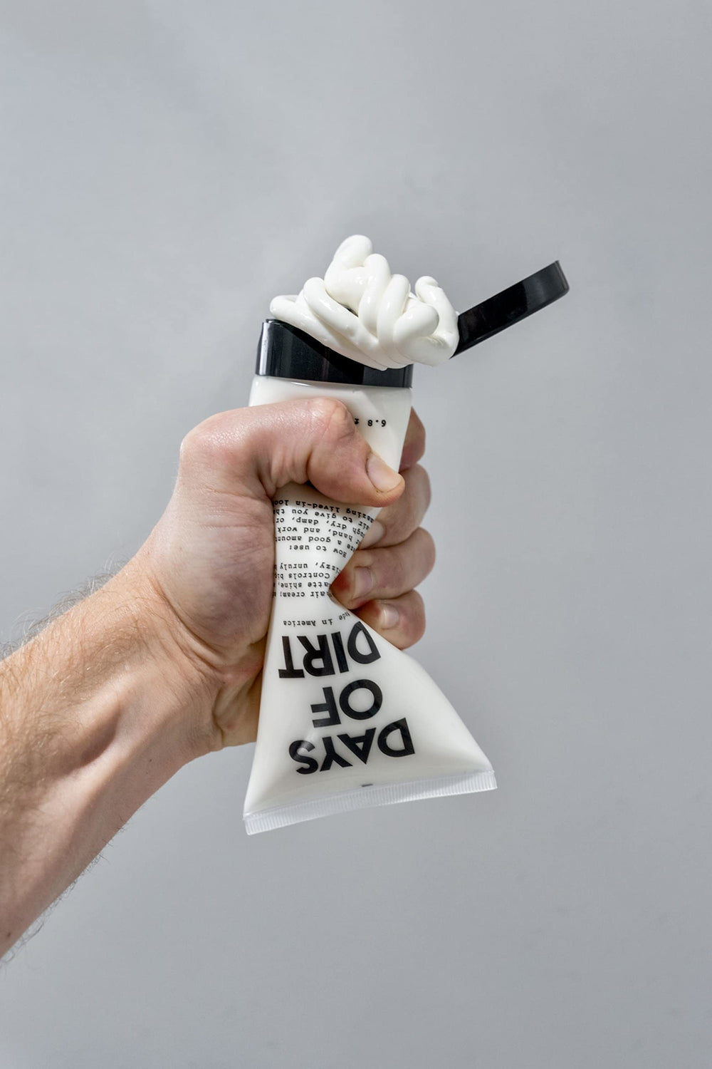 California Born Days of Dirt packaging and tube design emphasizing clean, USA-made formula.
