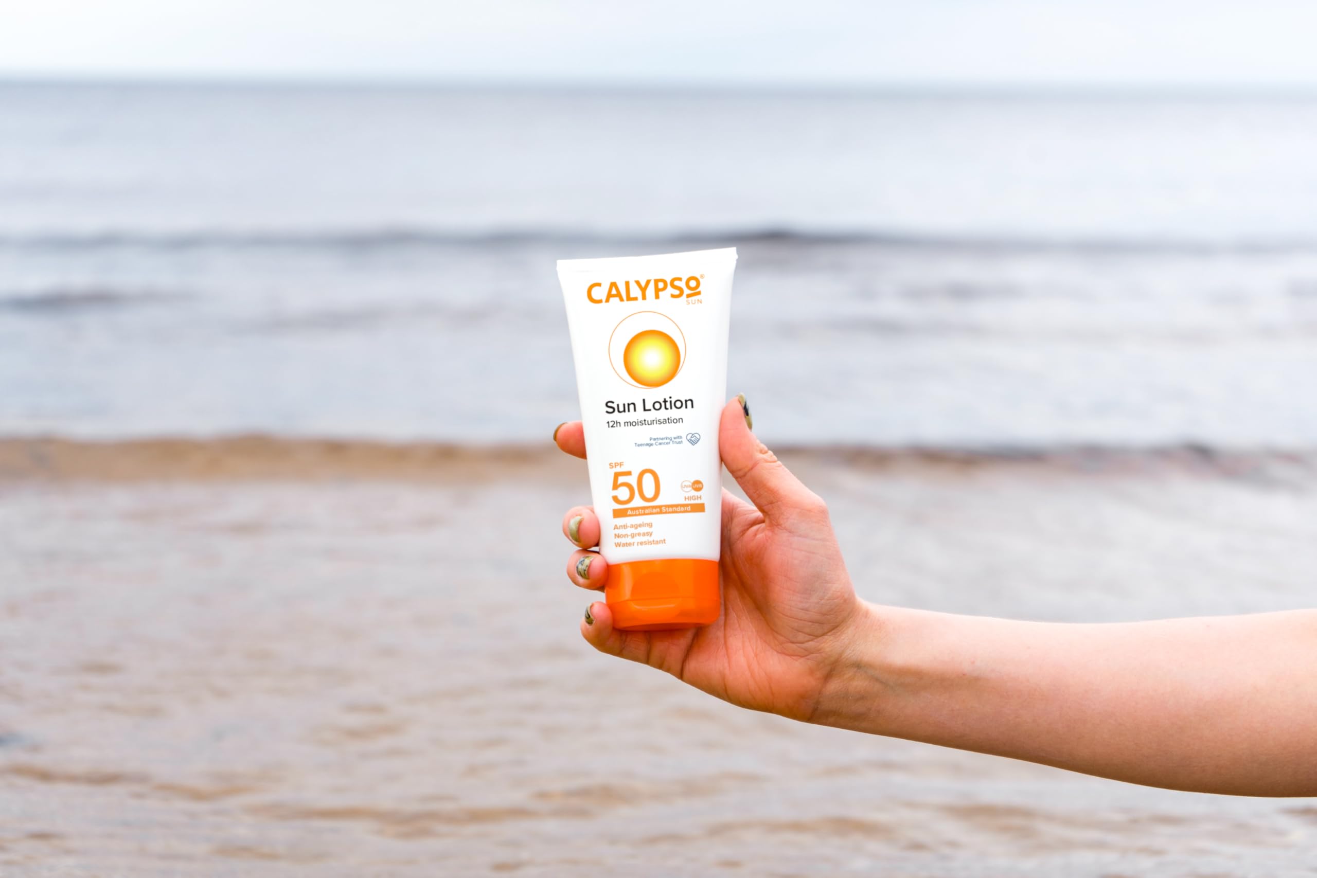 Calypso Linco Care Sun Lotion outdoors with family, emphasizing long-lasting sun care.