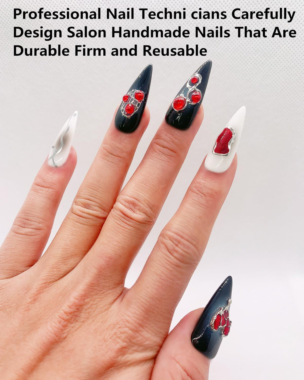 CAMILCY nails with black and white diamonds hand-painted for luxe detail.