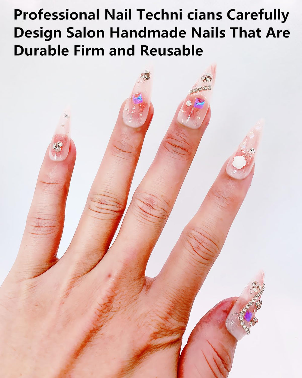 CAMILCY closeup pink long pointed nails show 3D glitz detail
