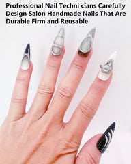 CAMILCY nails with black base and silver diamonds for a standout look.