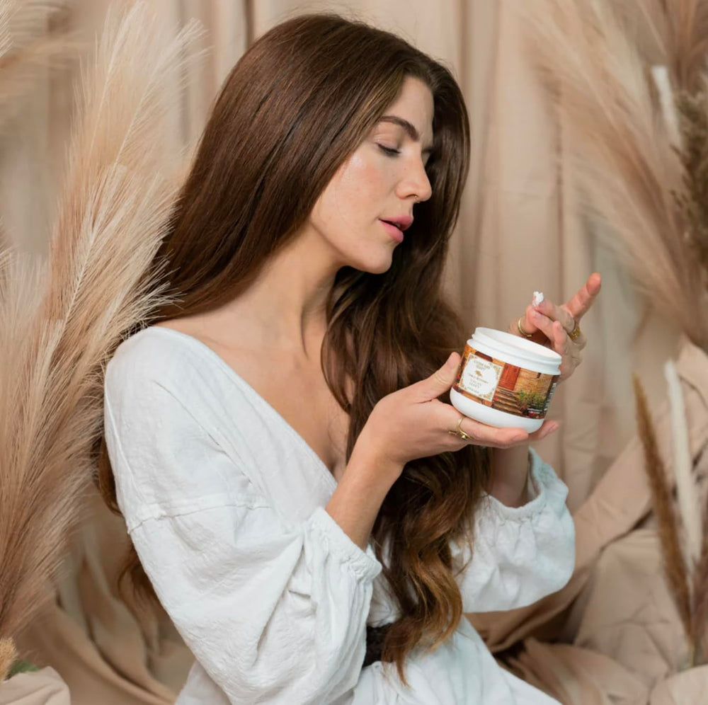Camille Beckman Glycerine Hand Therapy Cream Tuscan Honey texture swatch shows rich moisture.