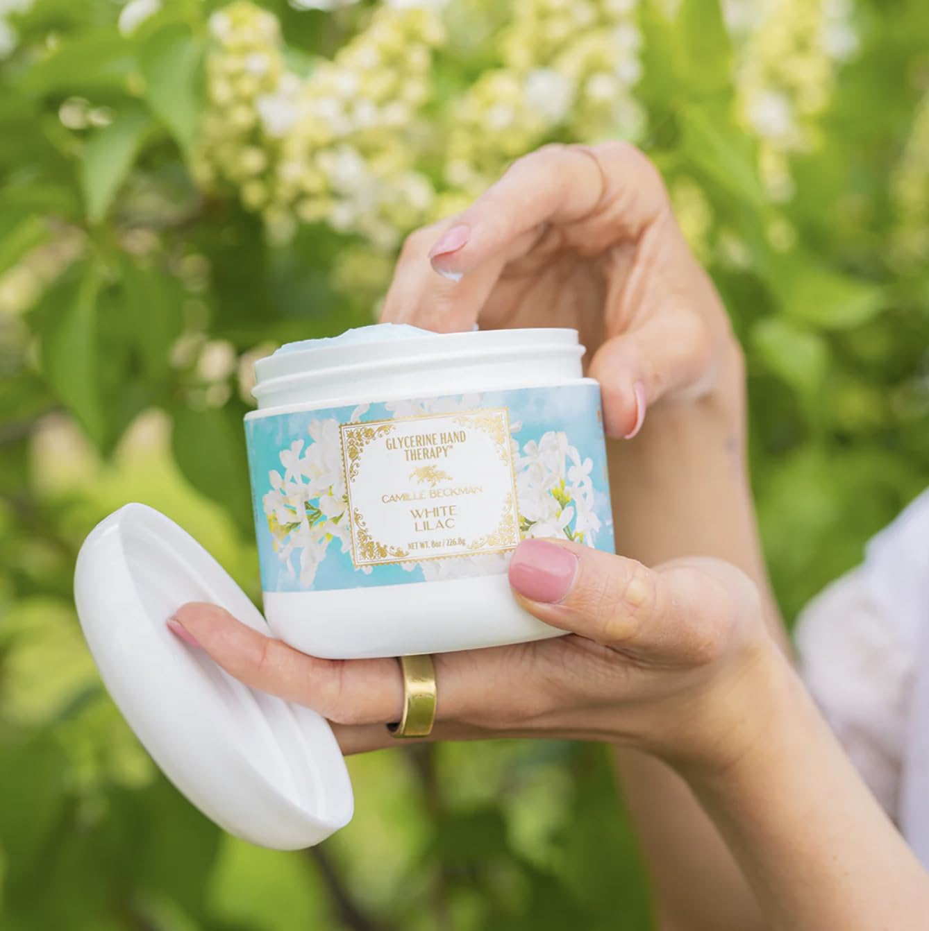 Label detail on Camille Beckman hand cream bottle