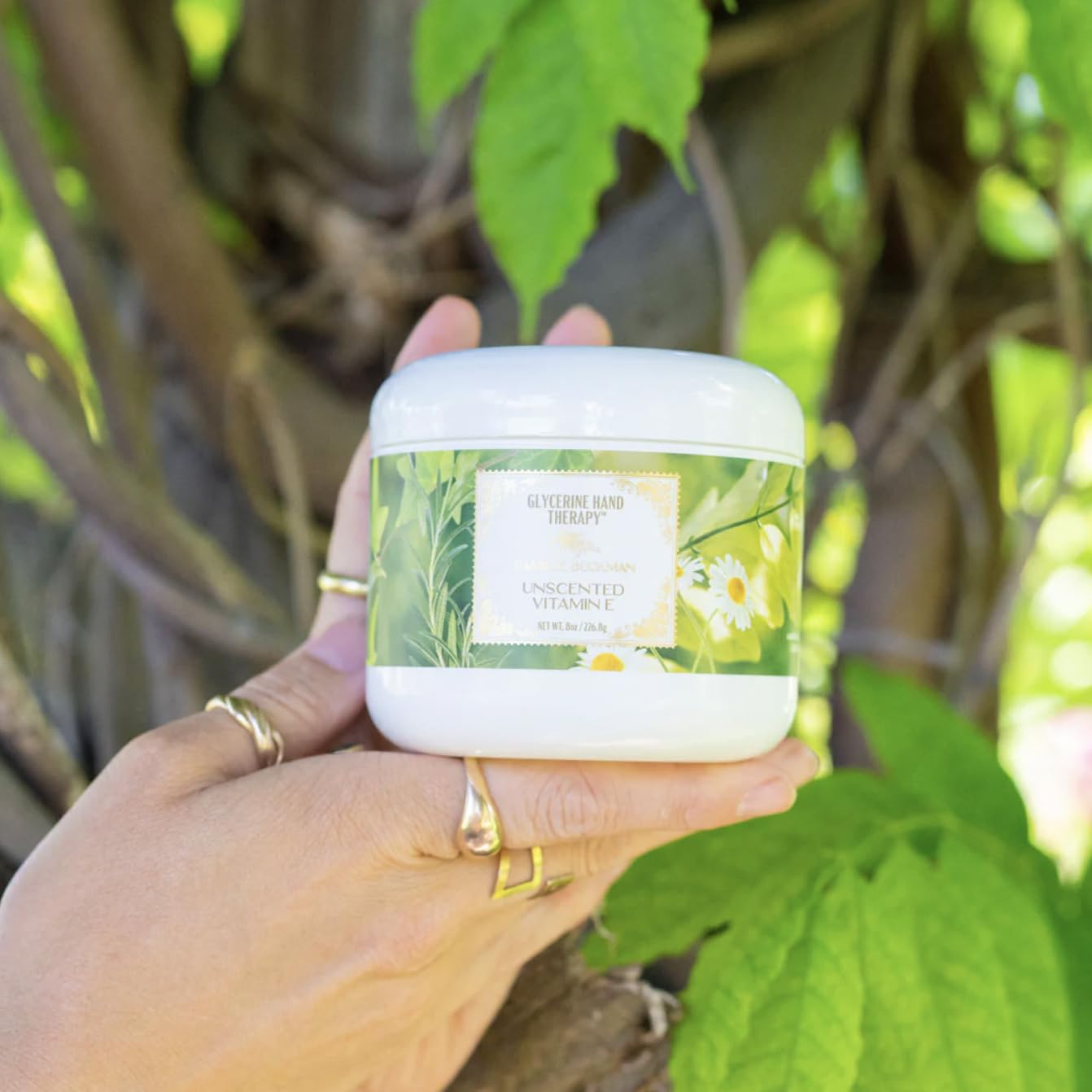 Camille Beckman hand cream texture application shows quick absorption