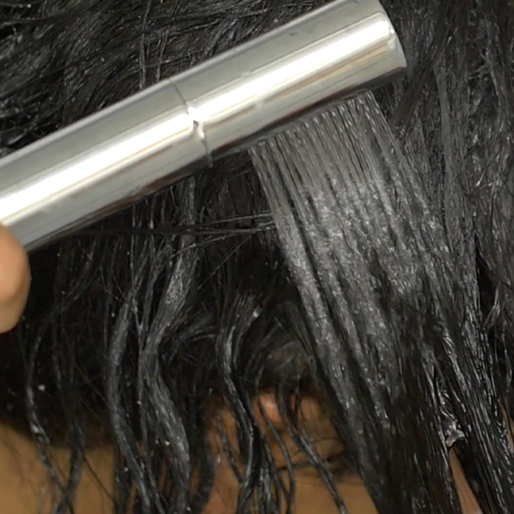Camille Rose Algae Renew Mask rinse demonstrates smooth removal after ten minutes.