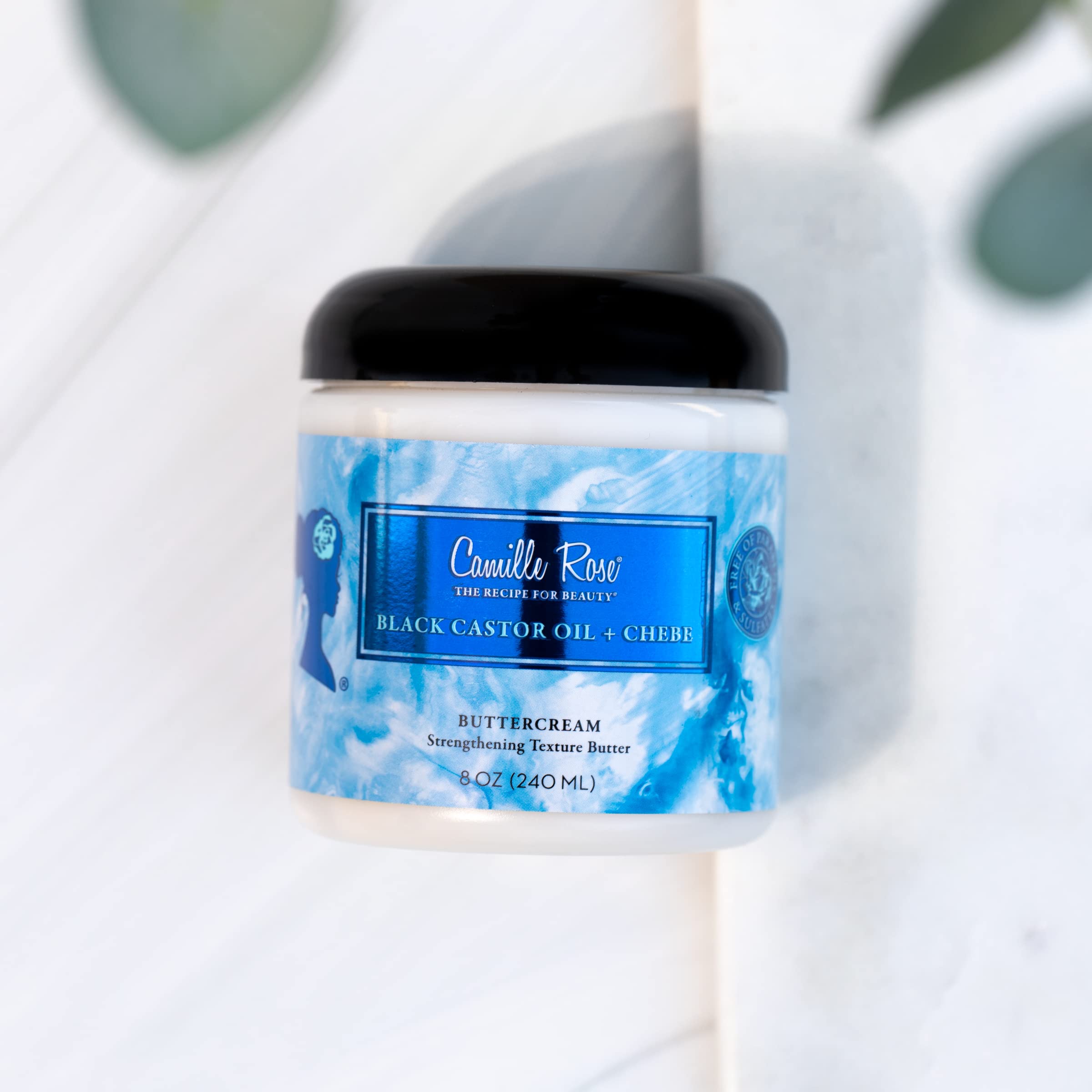 Camille Rose Black Castor Oil & Chebe Buttercream jar with rich texture for styling
