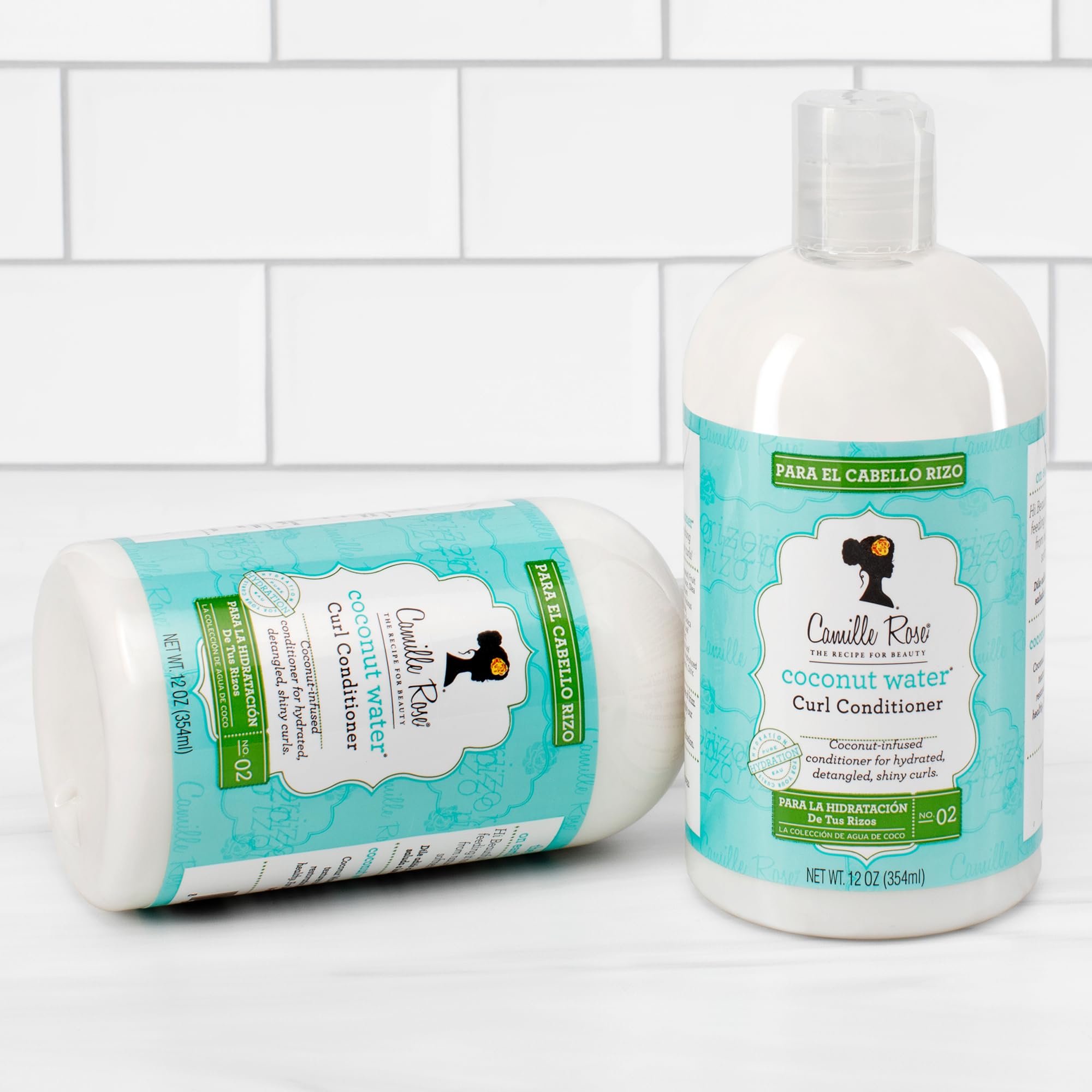 Model shows soft, bouncy curls after washing with Camille Rose.