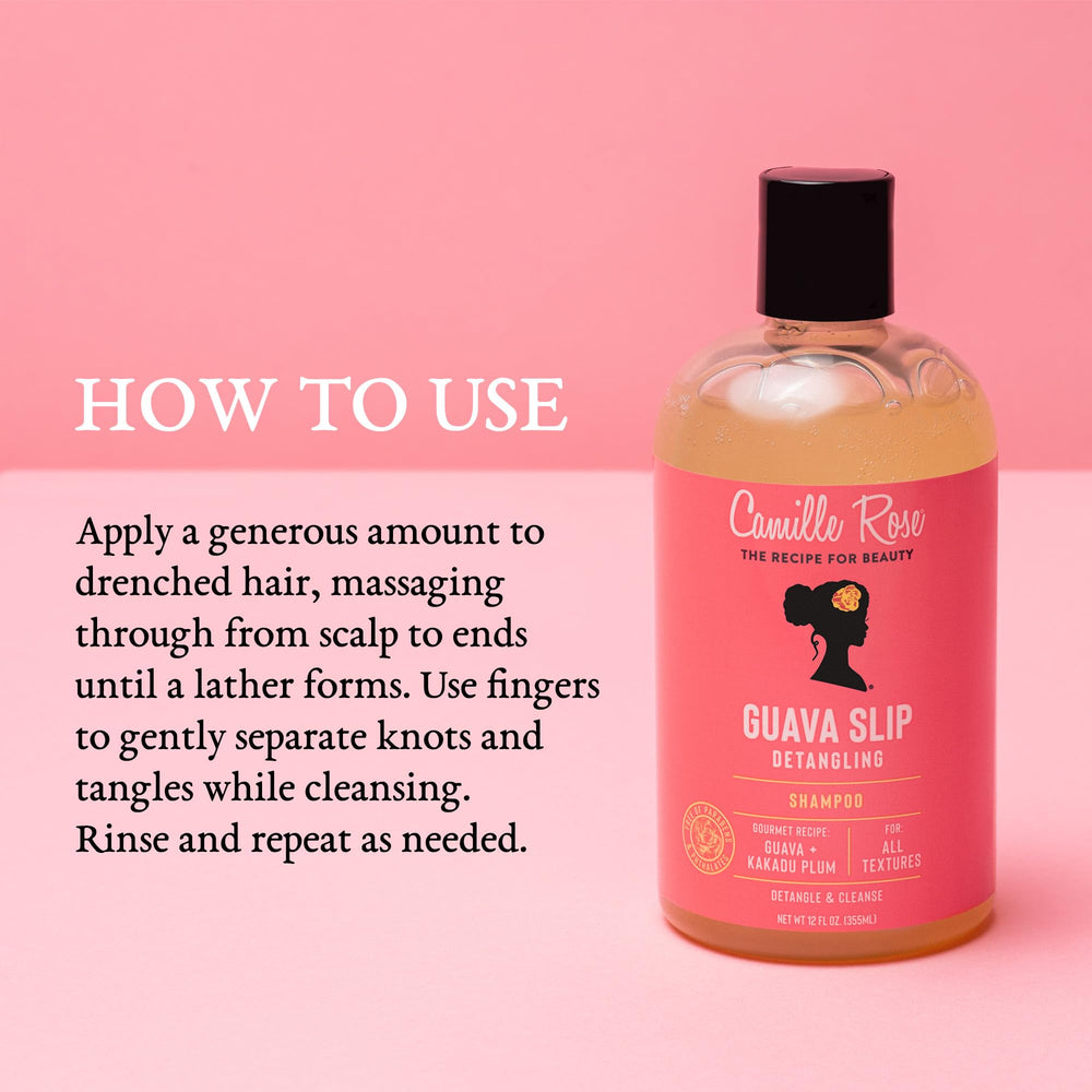 Camille Rose Guava Slip Detangling Shampoo on shower shelf with fresh scent.
