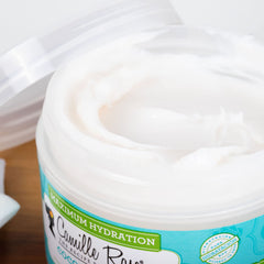 Hair shows silky, soft results after Camille Rose coconut treatment
