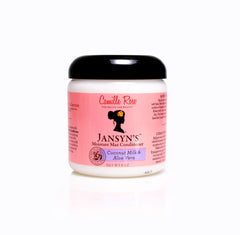 Camille Rose Jansyn’s Moisture Max bottle close-up showing deep hydration for dry hair