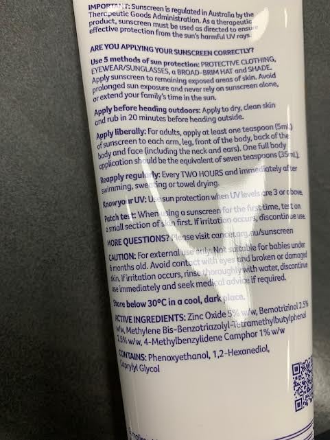 Cancer Council SPF50+ lotion on skin showing protection against sun exposure.