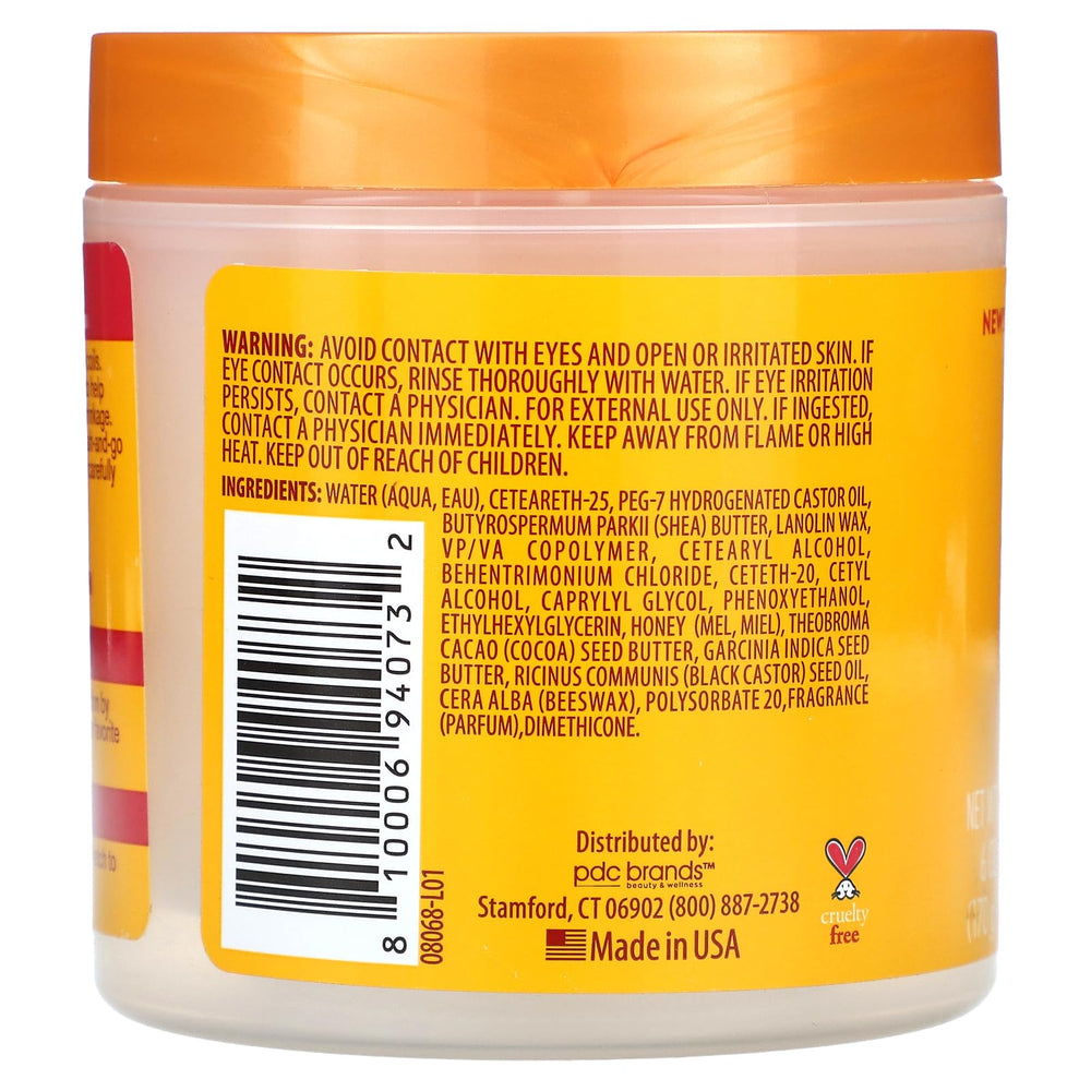 Cantu Jamaican Black Castor Oil Paste label highlights honey for soft hold.