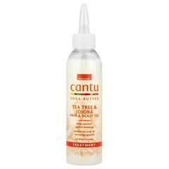 Cantu Shea Butter No Drip Oil bottle for easy, mess-free application and heat protection.